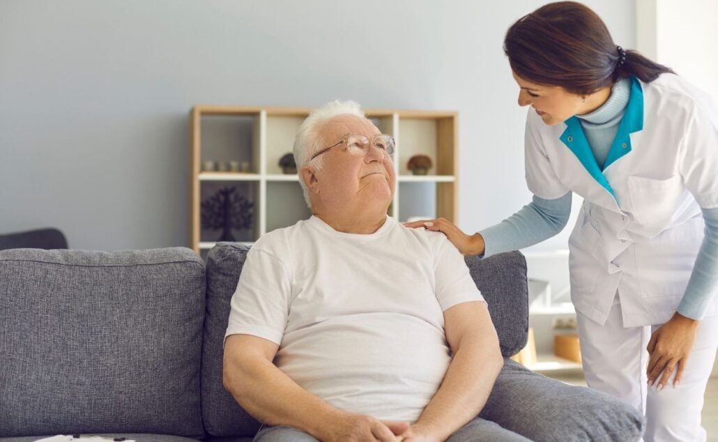 a senior and caregiver talking to each other