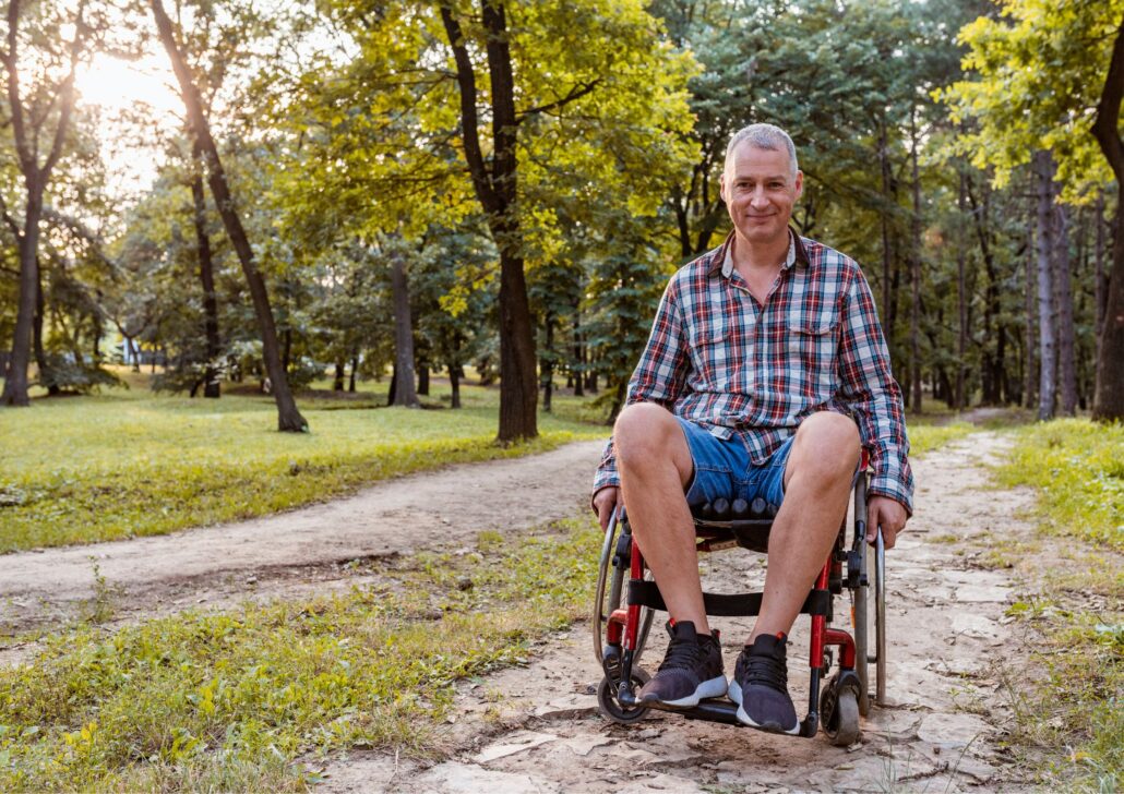 Man in wheelchair enjoying a park setting, emphasizing accessibility and outdoor activities for seniors in Washington D.C.