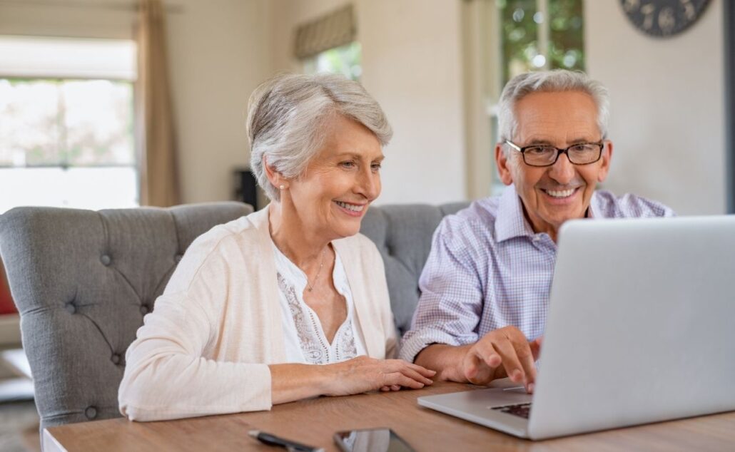 Senior Couple Using Laptop